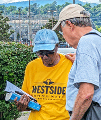 Volunteers pray at Westside