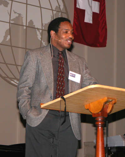 Dr Michael Johnson at podium