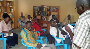 Jino teaching at Grace Theological College